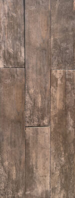 Shop Jet Antracita wood look porcelain tile flooring. Waterproof, durable, and perfect for kitchen, bathroom, and living room spaces.