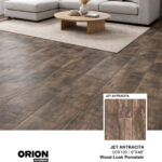 Shop Jet Antracita wood look porcelain tile flooring. Waterproof, durable, and perfect for kitchen, bathroom, and living room spaces.